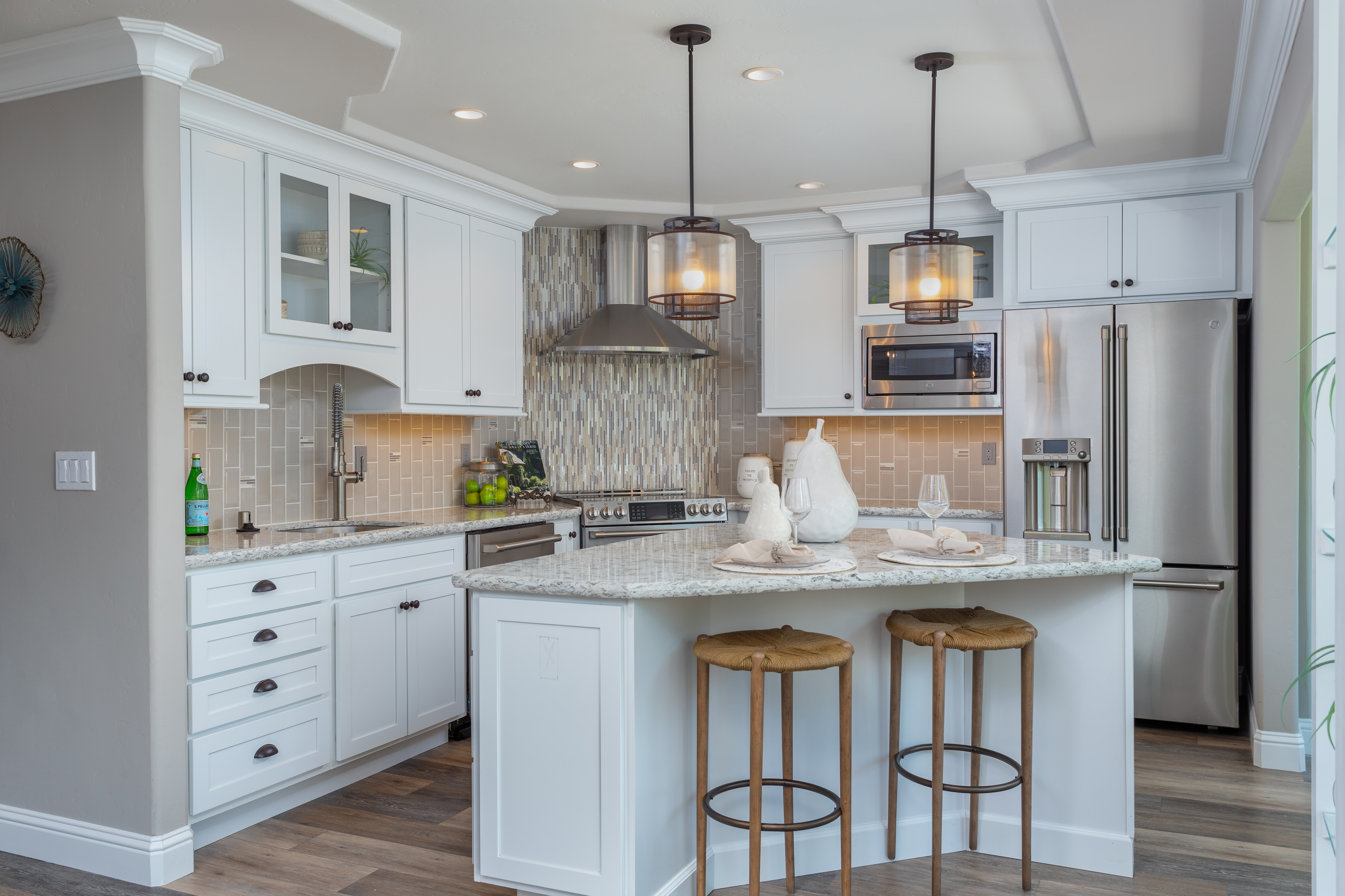 Toupin Construction kitchen remodel, white cabinets, granite island top 