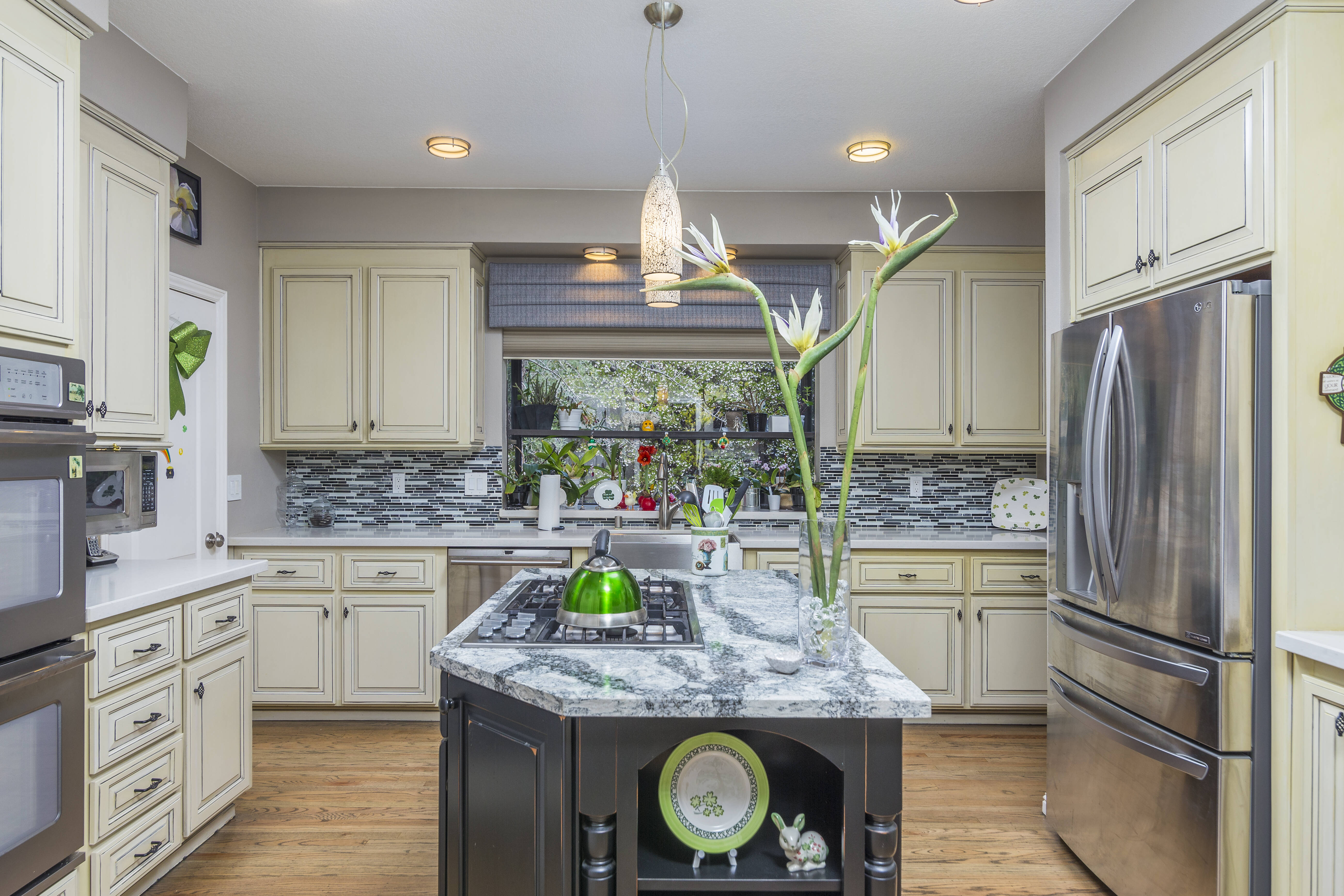 Granite countertop with decorative edge profile on kitchen island in East Bay home