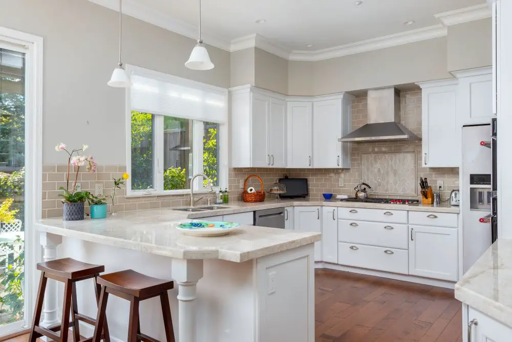 Bright kitchen with peninsula layout and natural light