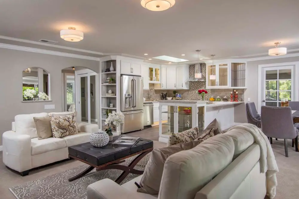 Walnut Creek Rossmoor open concept living room and white kitchen remodel with recessed lighting
