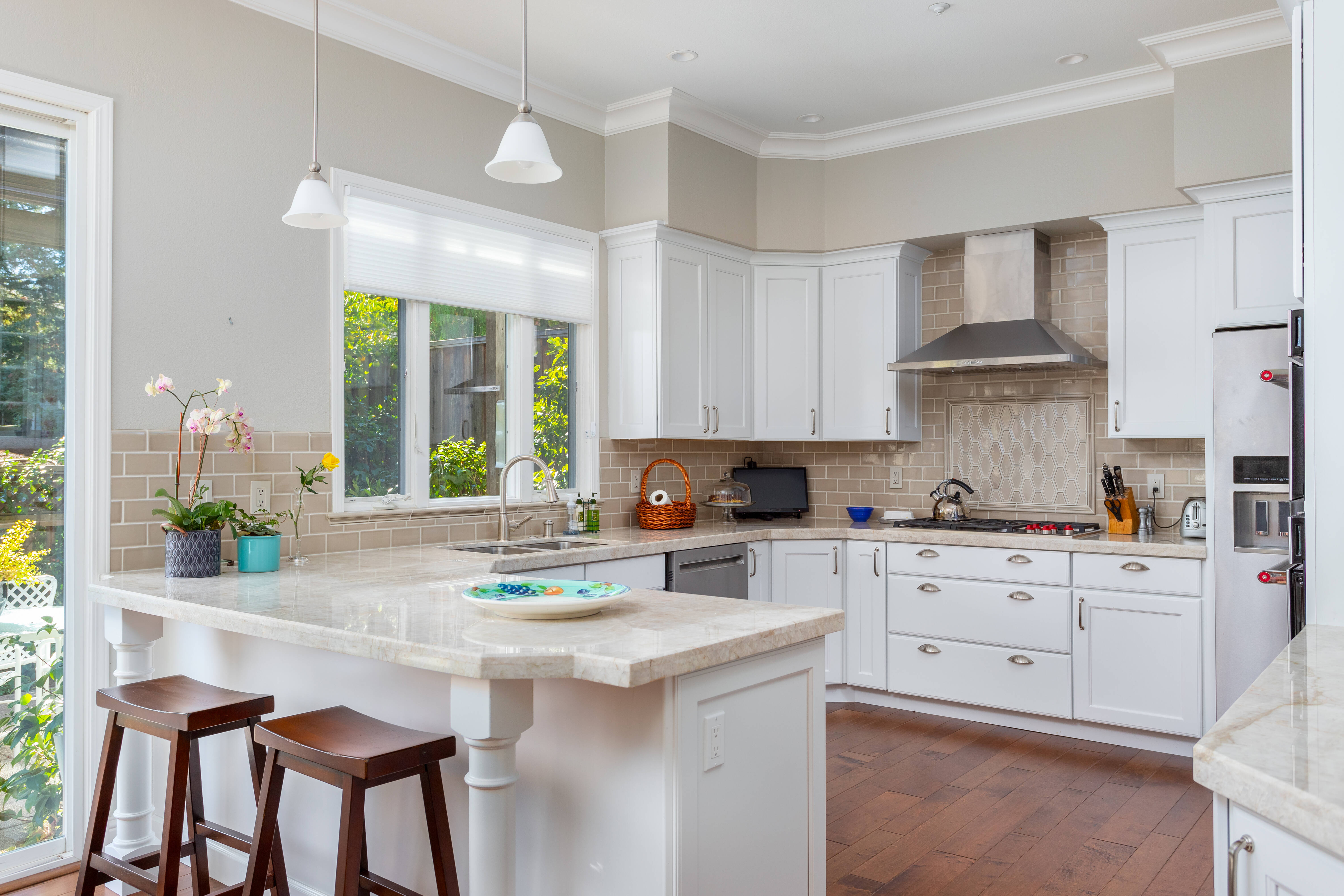 Quartz countertop with eased edge and island overhang for seating in Walnut Creek kitchen