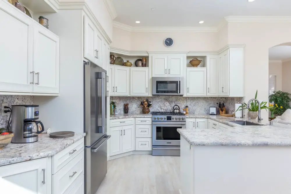 Walnut Creek Rossmoor white kitchen with shaker cabinets granite counters and stainless steel appliances